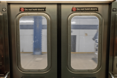 subway closing doors accident